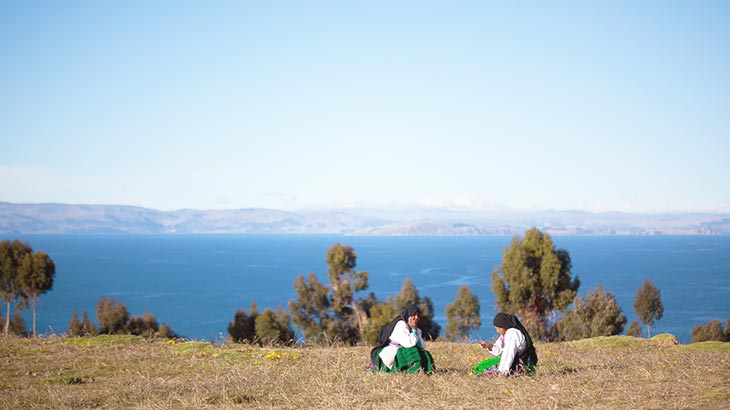 visit the amantani island in a trip from machu picchu to lake titicaca