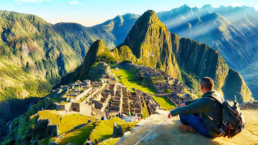 walking up machu picchu citadel