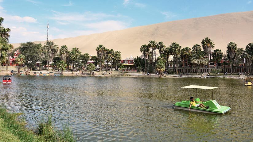 boat in huacachina oasis