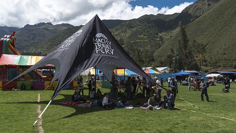 Machu Travel Peru tent in the stadium