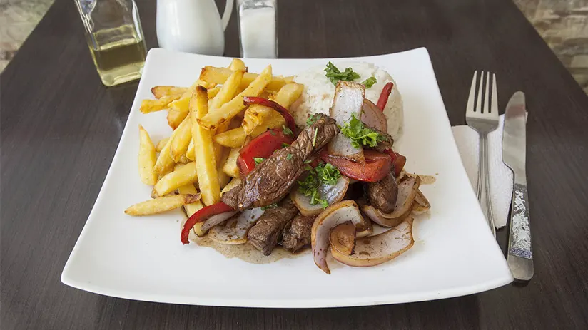 Tasting lomo saltado